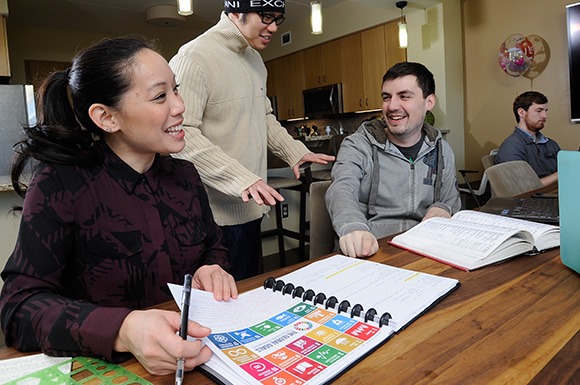 Grad students working at a table