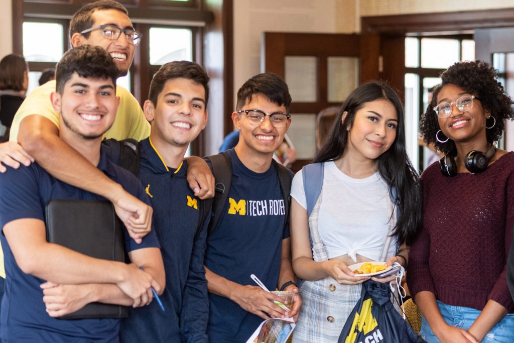 Group of students smiling at camera